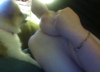 Chubby mature woman lets dog lick her big boobs and nipples