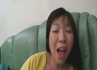 Brunette in yellow screaming her head off during dog fucking here