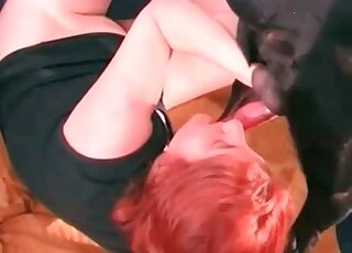 Redhead nasty whore experiments with blowjob and sucks dog's dick